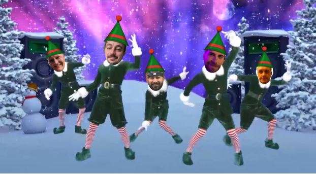 Team Members in Elf Costumes